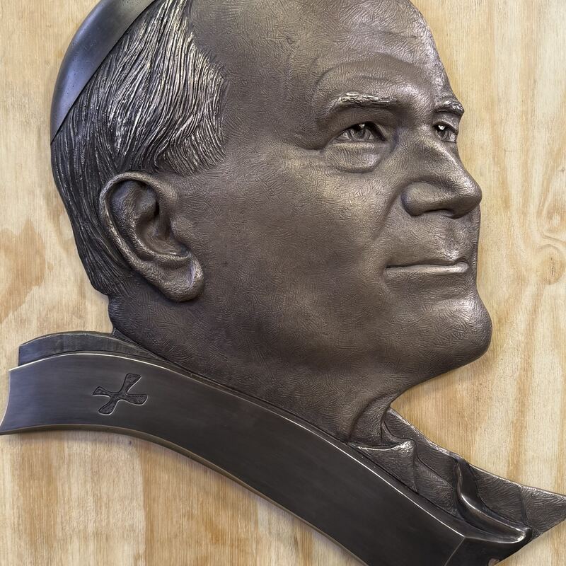 Bronze relief portrait of Pope John Paul II